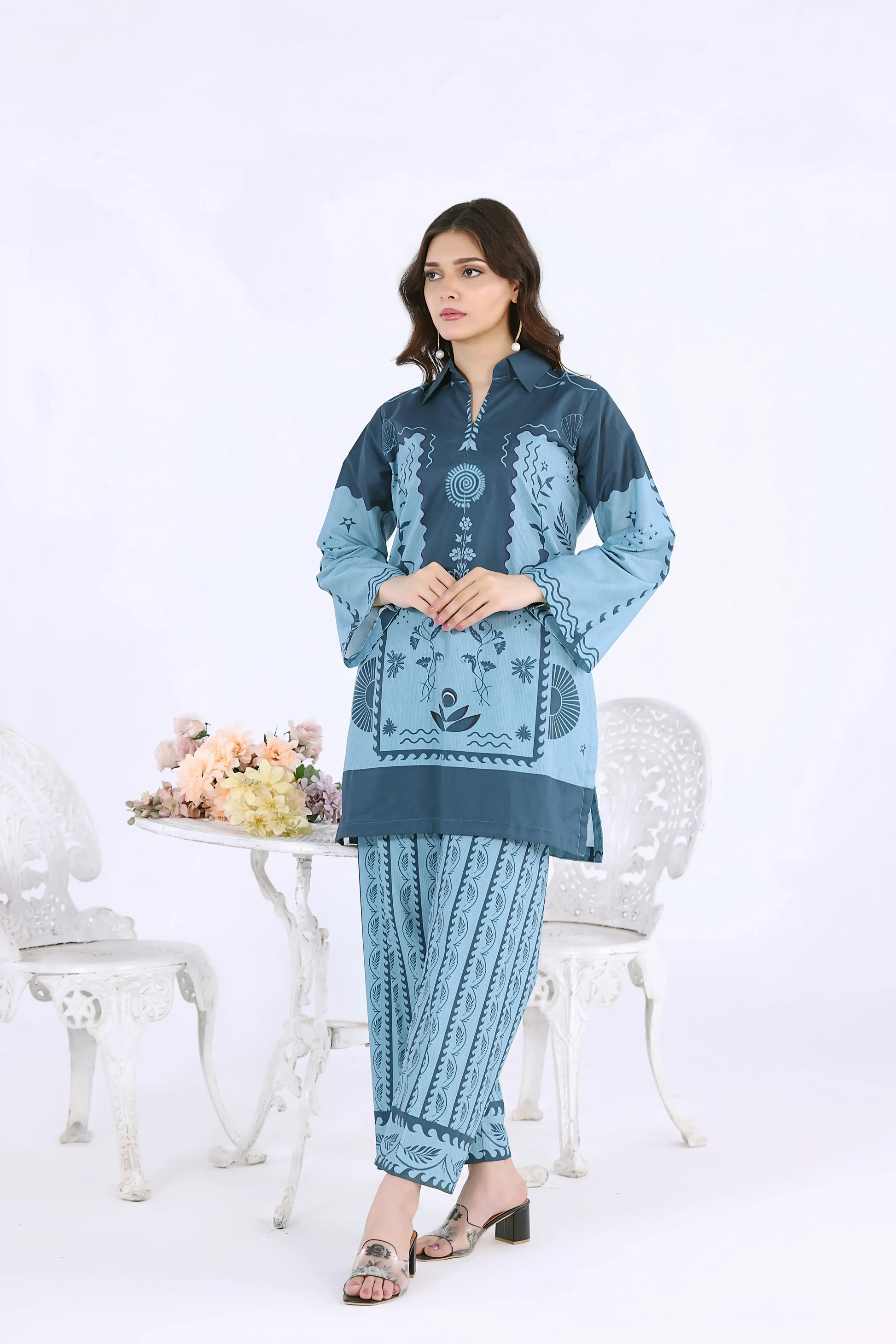 Women’s 2-piece midnight blue digital print co-ord set with ikat patterns and tassel neck details.