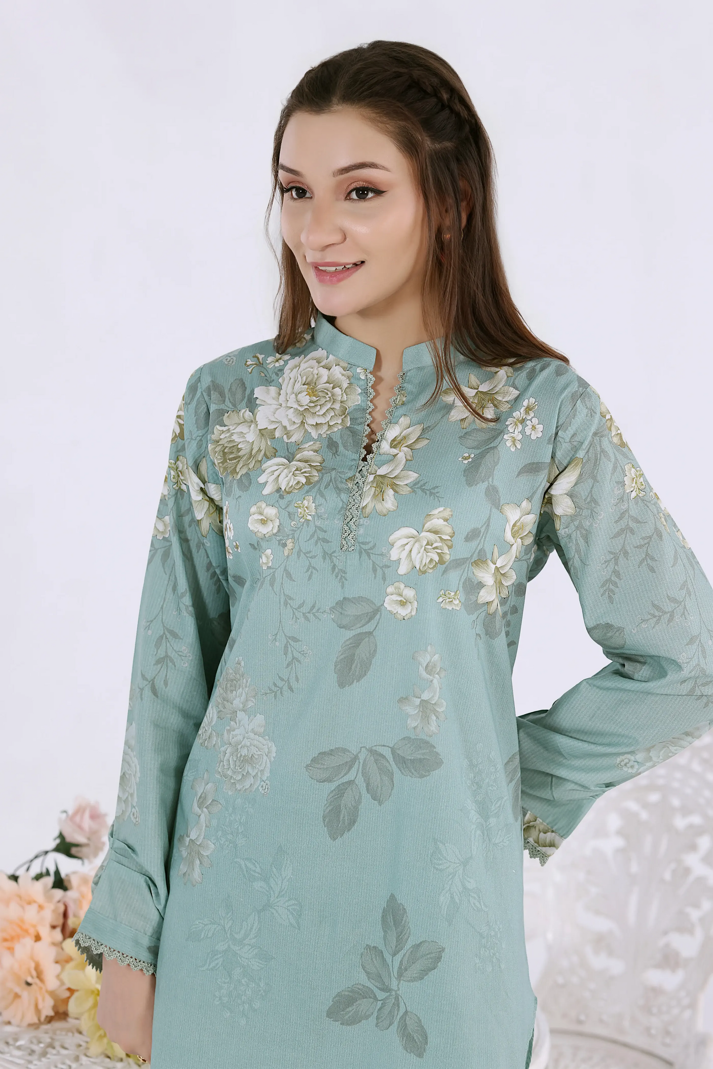 Close-up of high-definition floral digital print on premium cotton lawn with dainty lace finishing.