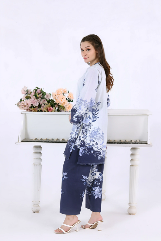 Side-back view of the blue floral co-ord set showing the clean drape and matching printed trousers.