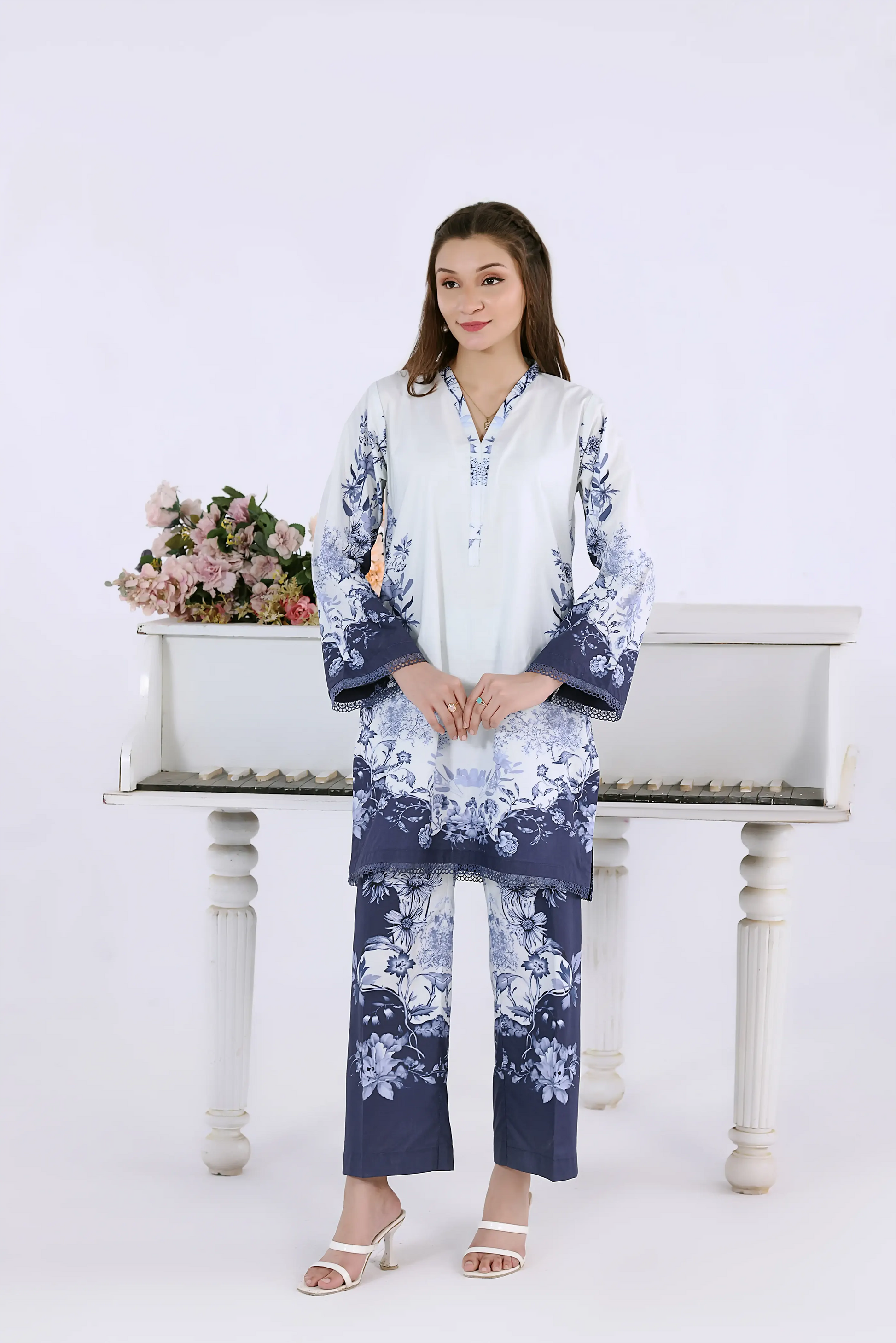 Women’s 2-piece blue and white digital print co-ord set featuring soft white floral motifs and a mandarin collar.
